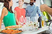 Food and wine on table at party