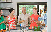 Friends laughing together at party