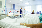 Patient laying in hospital bed