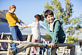 Teacher and students playing outdoors