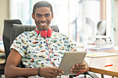 Man using digital tablet in office