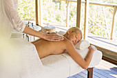 Woman having massage at spa