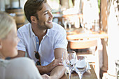 Couple sitting together in restaurant