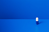 Prescription pill standing upright