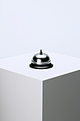 Call bell sitting on pedestal