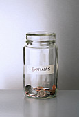 Savings change jar on counter