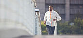 Man running through city streets