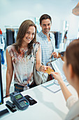 Woman paying with credit card