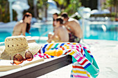 Sunhat, sunglasses and beach towel