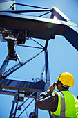 Worker using walkie-talkie