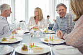 People enjoying fancy meal in restaurant