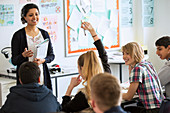 Teenage students learning in classroom