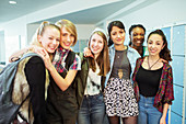 Female students standing in locker room