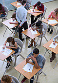 Students writing their GCSE exam