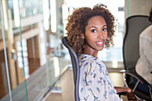 Businesswoman sitting in chair