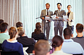 Business people giving presentation