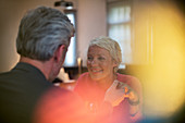 Romantic older couple holding hands