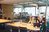 Businesswomen shaking hands meeting