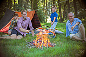 Boy, father and grandfather relaxing