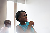 Student in blue top at seminar