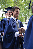 Students congratulating one another