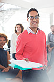 Businessman holding documents