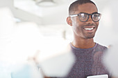 Portrait of young smiling businessman