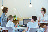 Office workers having lunch together