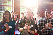 Portrait of clapping audience