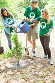 Environmentalist volunteers watering