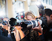 Close up of paparazzi photographers