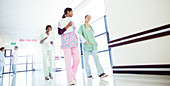 Nurses talking and walking