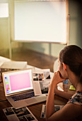 Businesswoman reviewing photographs