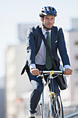 Businessman commuting on bicycle
