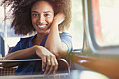 Portrait smiling woman riding bus