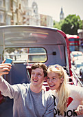 Couple taking selfie in London