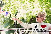 Woman waving British flag