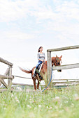 Woman horseback riding