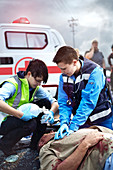 Rescue workers performing CPR