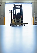 Forklift parked in warehouse