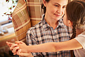 Mother and daughter holding hands