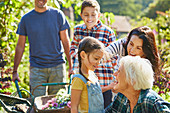 Multi-generation family bonding in garden