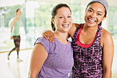 Portrait smiling women in exercise class