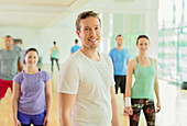 Portrait smiling man in exercise class