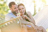 Affectionate couple in summer hammock