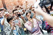 Audience using camera phones