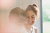 Affectionate couple kissing and smiling