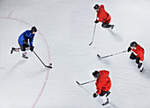 Hockey defenders guarding opponent