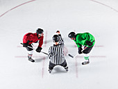Hockey referee during opening face off