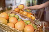 Fresh oranges in basket at market